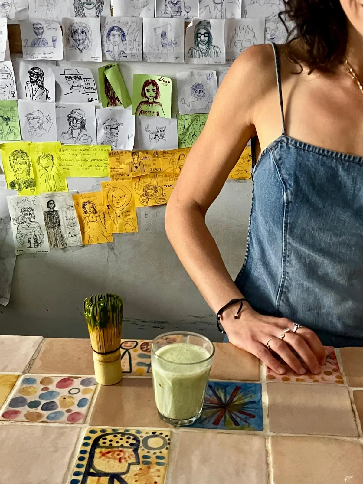 A latte on a hand-painted tiled counter